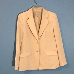Cream suit with small orange stripes. Size 10